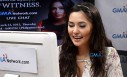 Gwen reads one of the questions out loud for those watching the live streaming of her chat.