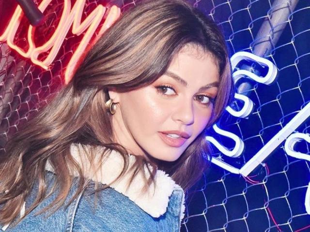 Janine Gutierrez in oversized denim jacket