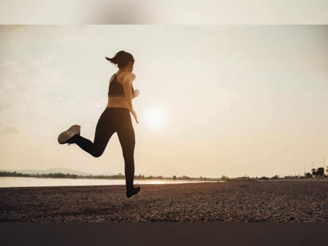 Young fitness woman runner