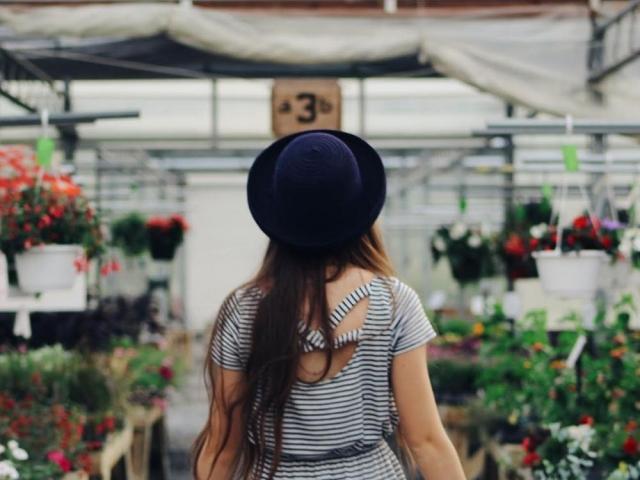 woman walking in an urban garden