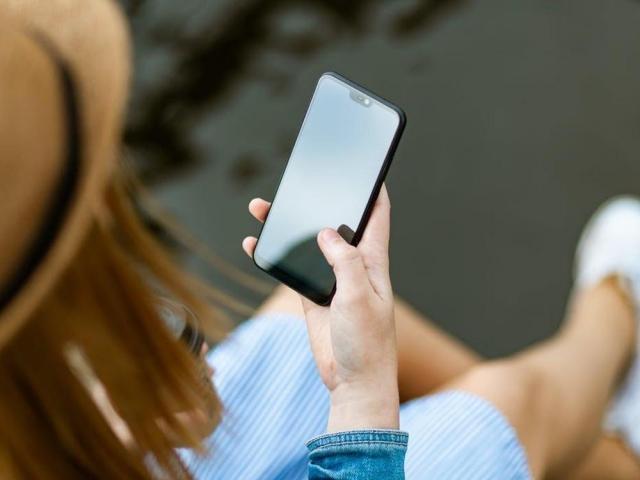 woman using smartphone
