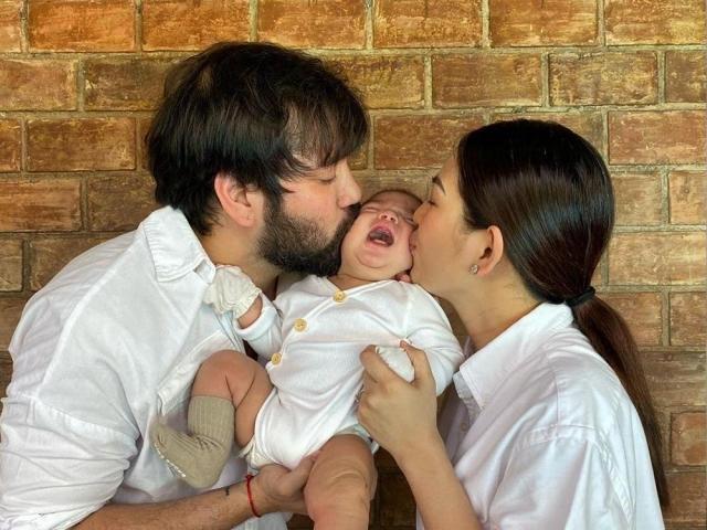 Luane Dy and Carlo Gonzalez kissing baby Jose Christiano