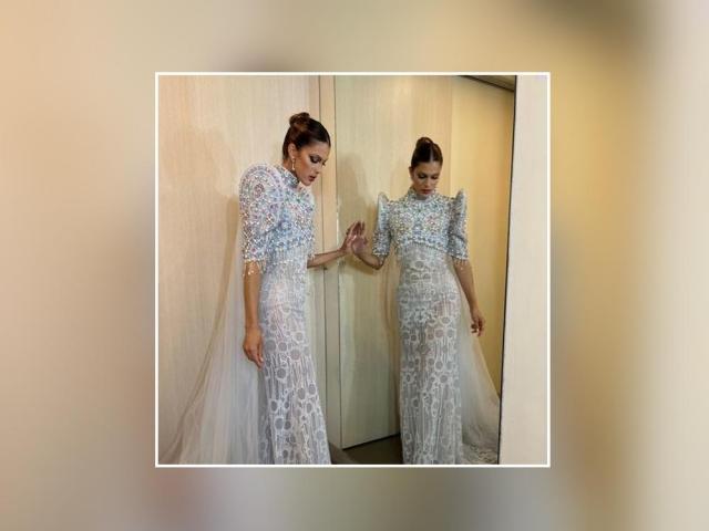 Iris Mittenaere wearing Michael Cinco