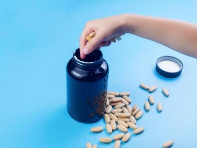 small hand with pills