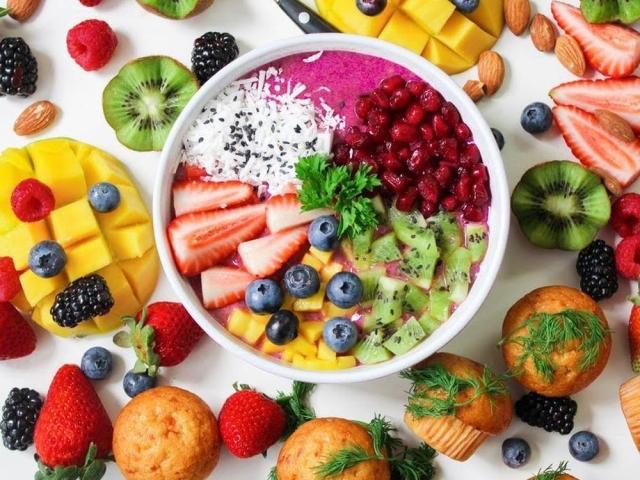 a bowl of fruits and nuts