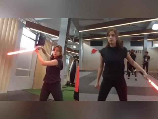 ysabel ortega holding laser sword