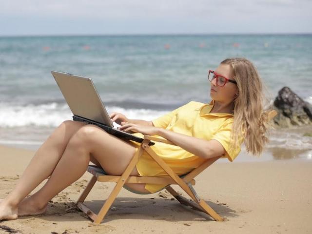 woman working by the beach