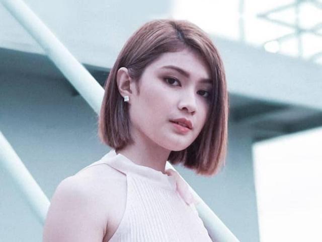 Thea Tolentino in beige halter top