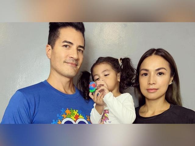 Aubrey Miles and Troy Montero with daughter
