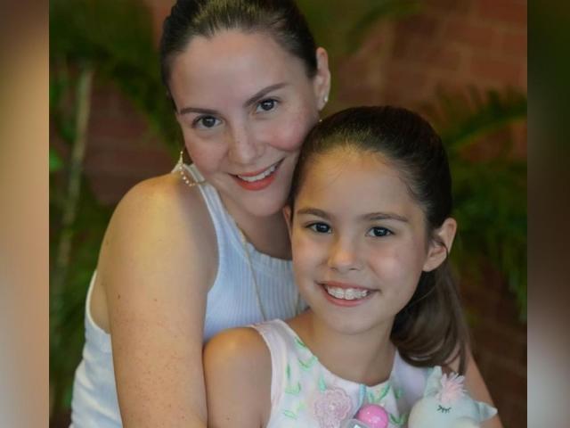 Kendra Kramer wearing Chesca Garcias shoes and blouse