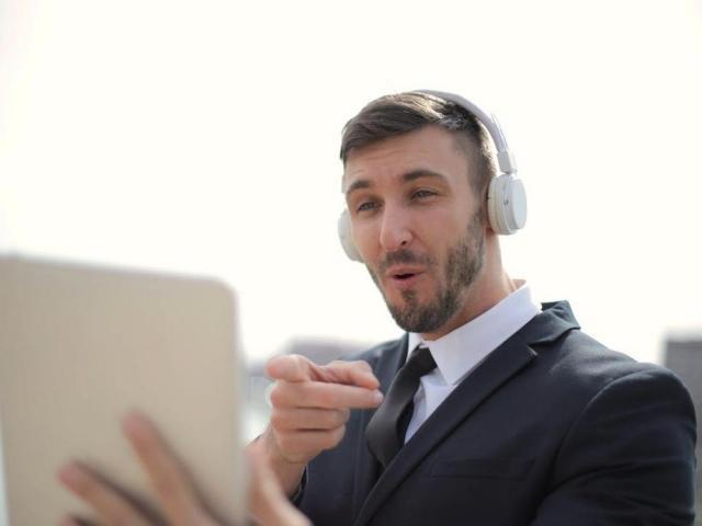 man in front of an electronic gadget