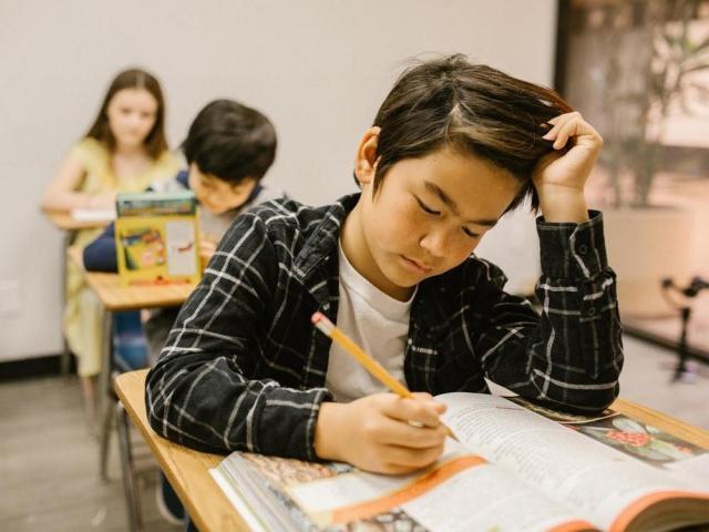 child studying