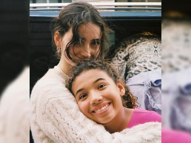 Meadow Walker hugging Hania Riley