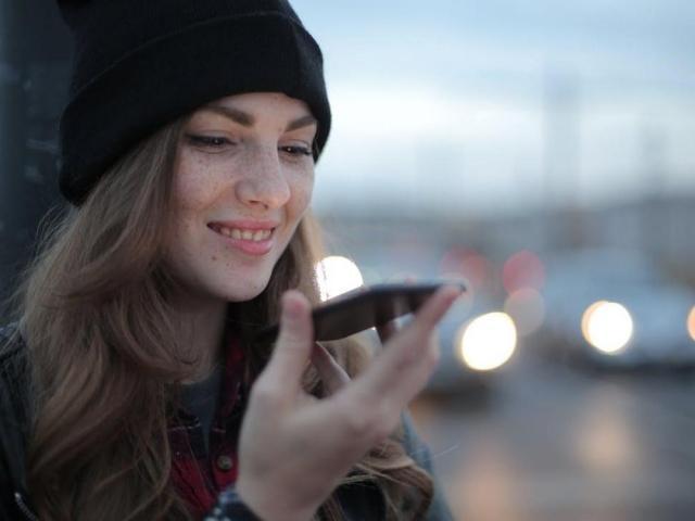 woman using smartphone