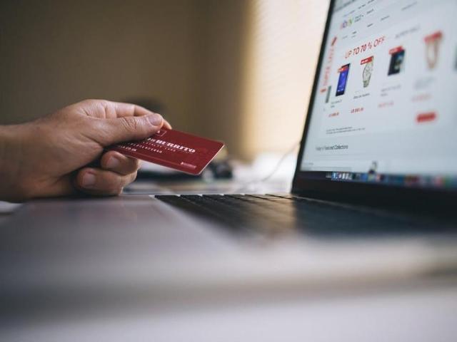 credit card and laptop