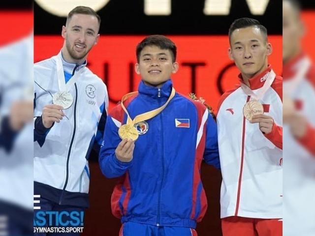 Pinoy gold medalist Carlos Yulo returns to PH