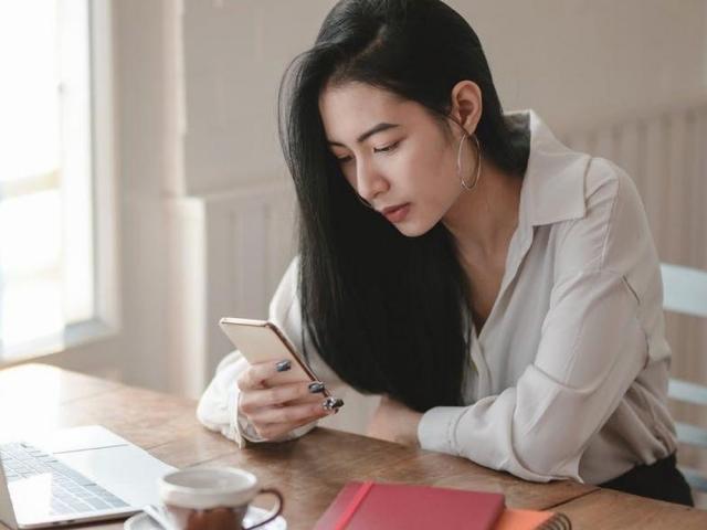 woman using smartphone