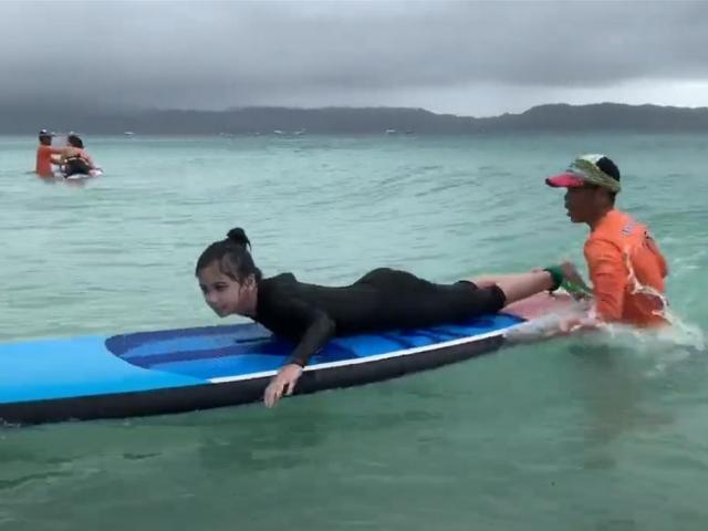 Sofia Pablo tries surfing in Boracay