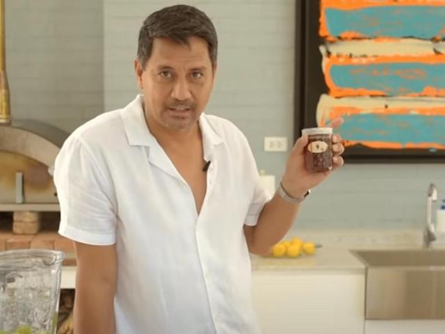 Richard Gomez harvests honey