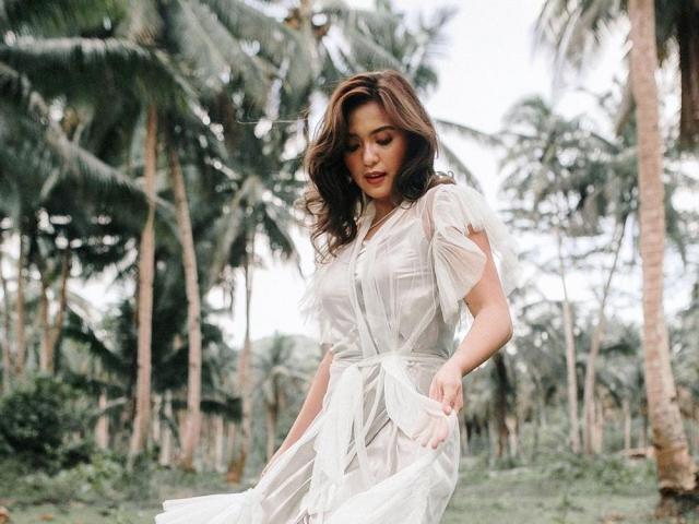 Joyce Pring fits bridal gown New York