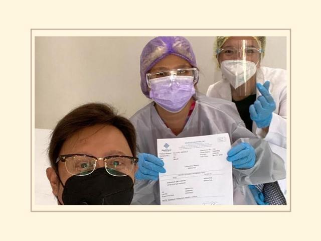 Arnold Clavio with healthcare workers