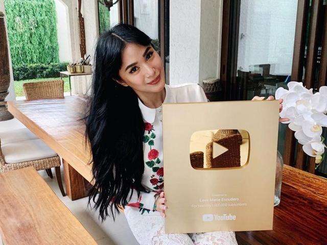 Heart Evangelista with gold YouTube trophy