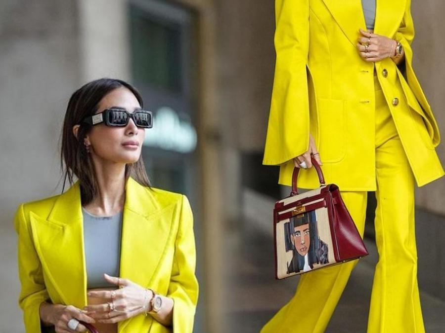 Heart and her hand-painted Hermes bag at Milan Fashion week