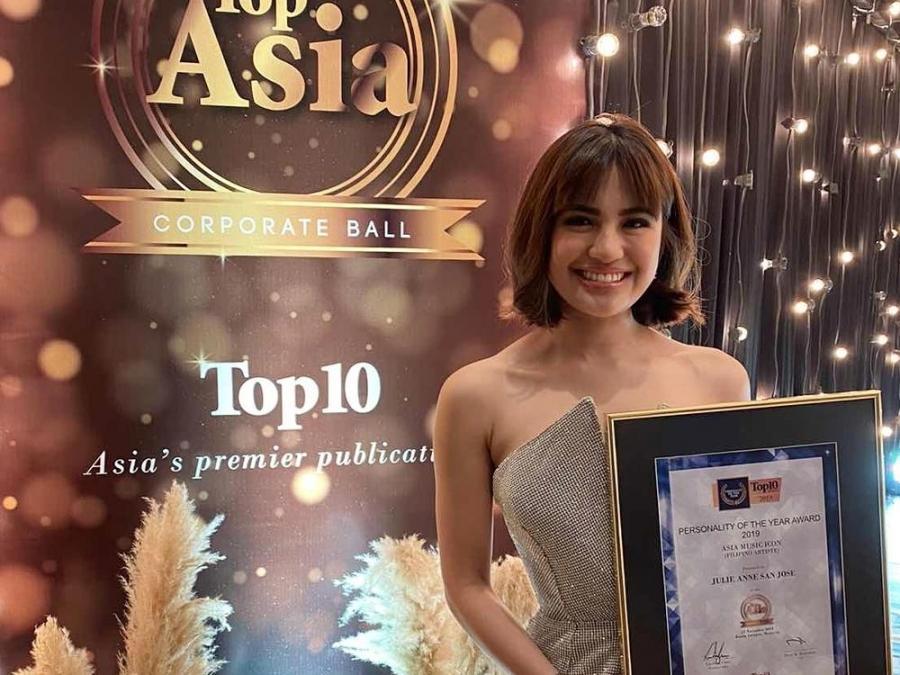Julie Anne San Jose with her plaque from Top Asia Awards
