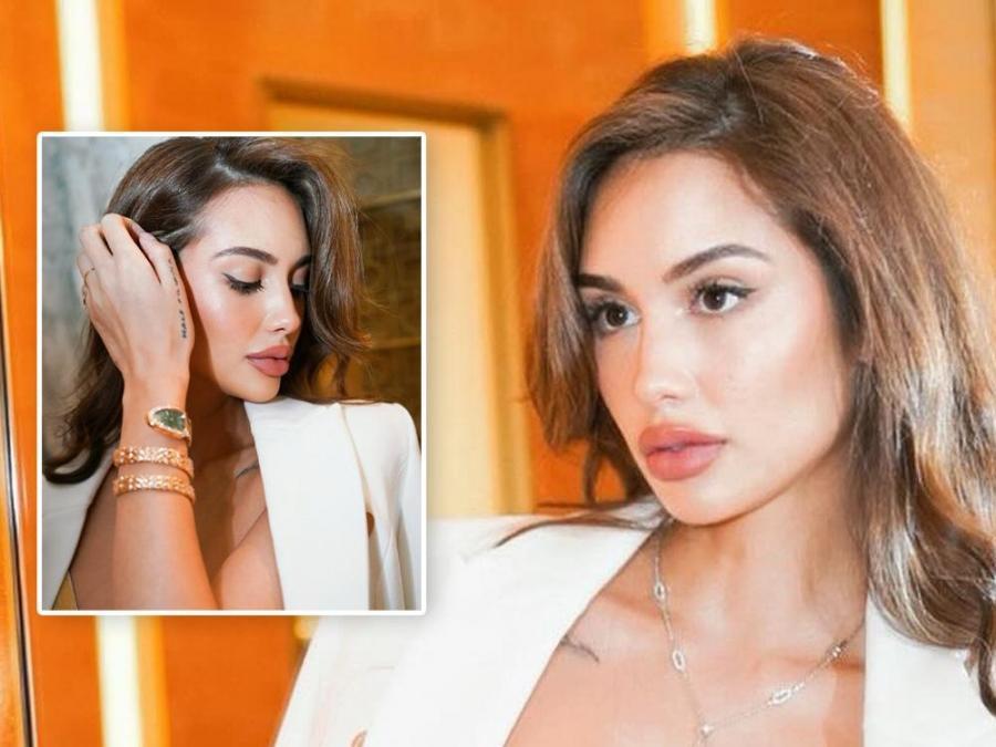 Celeste Cortesi glows with golden accessory