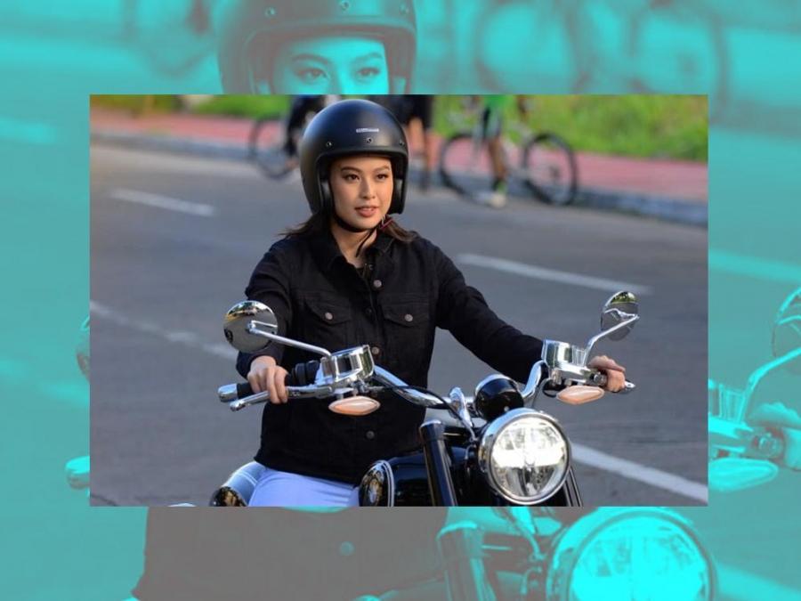 Michelle Dee riding the BMW R 18 motorcycle