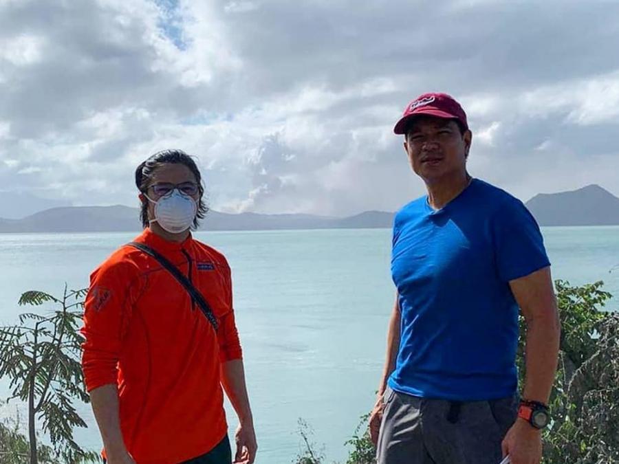 Doc Nielsen Donato and son Cedrick help animals in Taal Volcano eruption