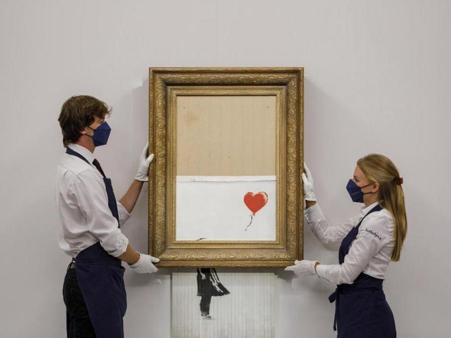 Shredded Banksy Artwork Sells For $25.4 Million | GMA Entertainment