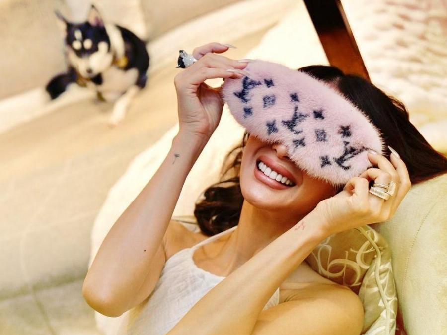 Heart Evangelista's sleep mask is a pink fluffy Louis Vuitton