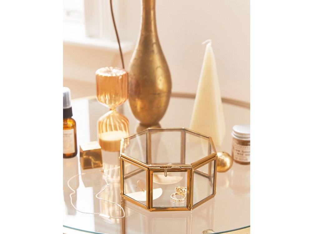 A golden polygon jewelry organizer
