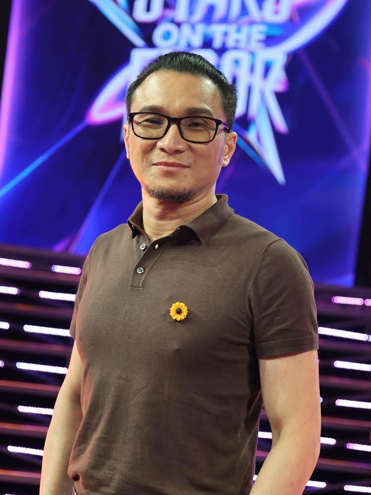 Coach Lowell Louie Tan