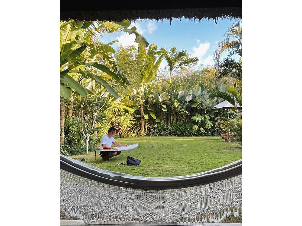 Philmar and his surfboard