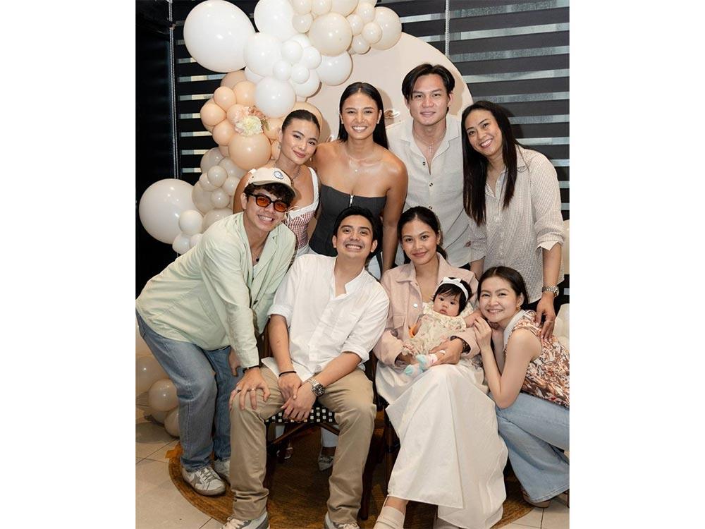 Anya with Ninong Kokoy de Santos, Ninang Klea Pineda, and Ninong Ervic Vijandre