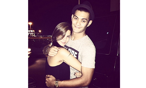 Tricia smiling shyly