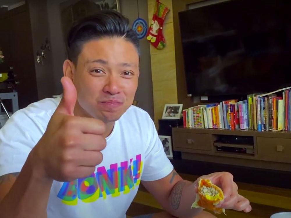 Drew eating empanada