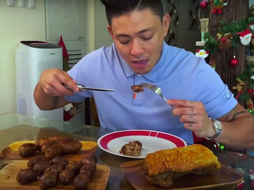 Drew eating Ilocos longganisa and bagnet