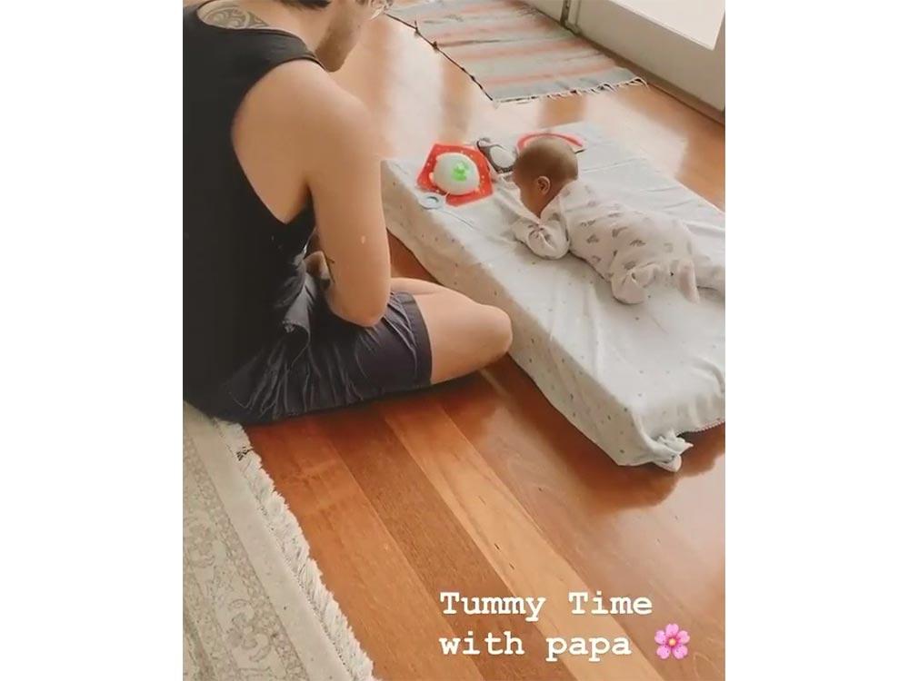 Tummy time with daddy Erwan