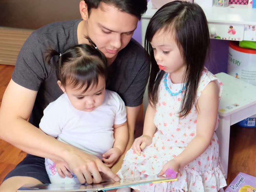 Patrick Garcia and daughters