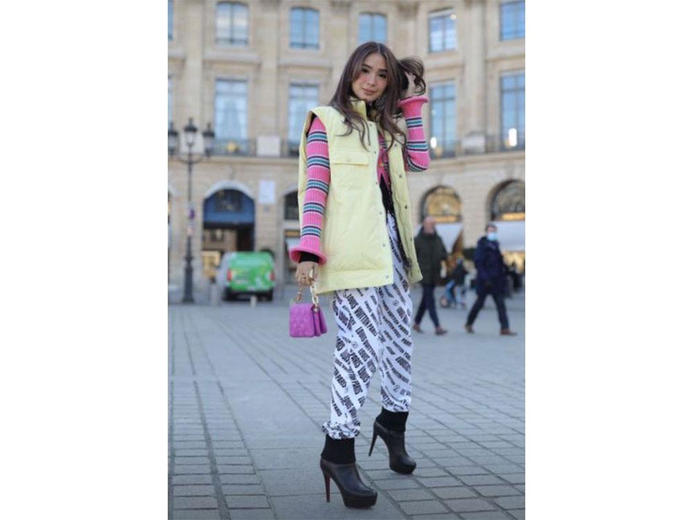 Electric l💛ve. Heart Evangelista @iamhearte on her way to the Chanel Gala  during Paris Fashion week. In custom #markbumgarner…