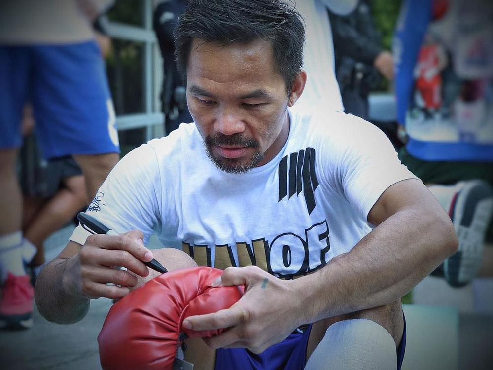 SO SWEET: Jinkee feeding husband Manny Pacquiao after bout with Ugas