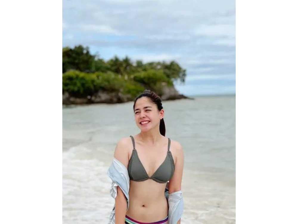 LOOK Maine Mendoza flexes flabby abs in new bikini photo GMA