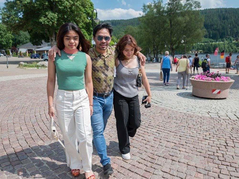 Manny with daughters