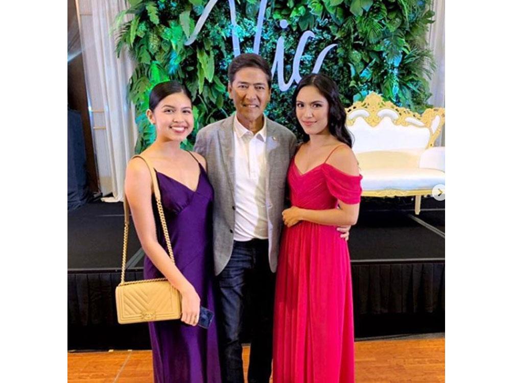 Two ladies and a gentleman