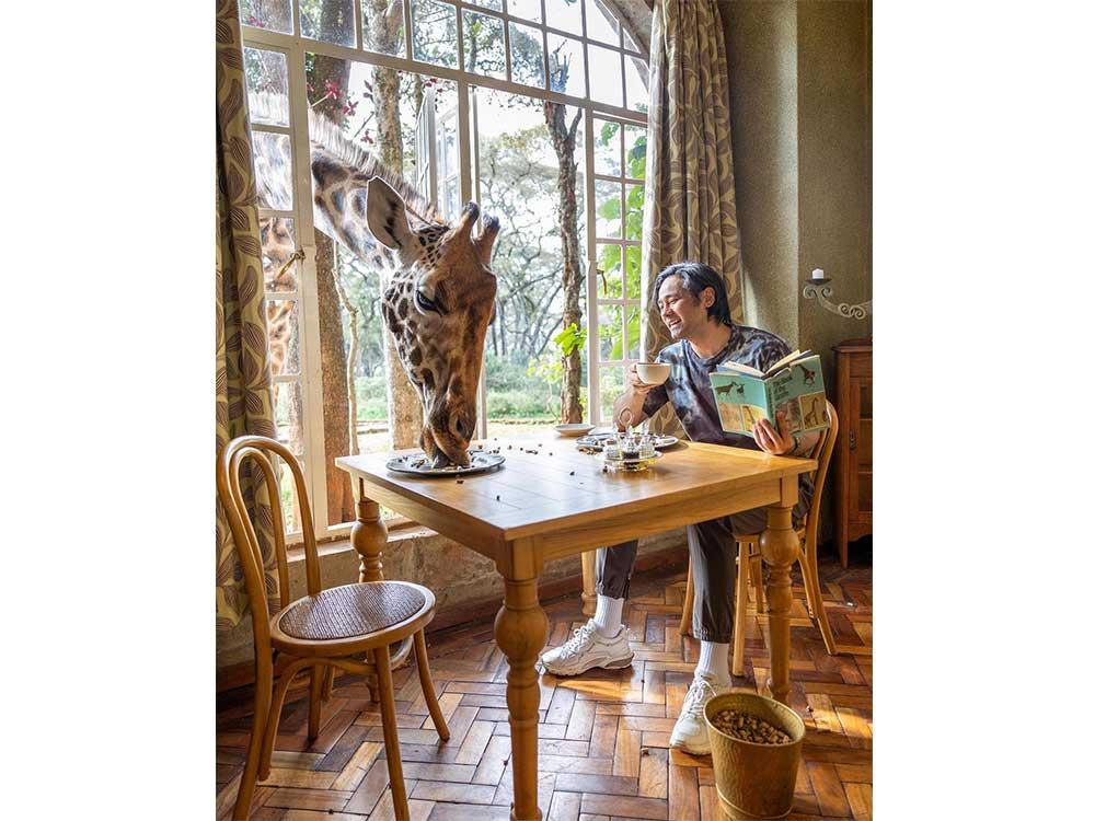 Hayden's breakfast with a giraffe