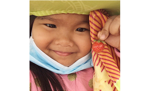 Ryzza picks strawberries