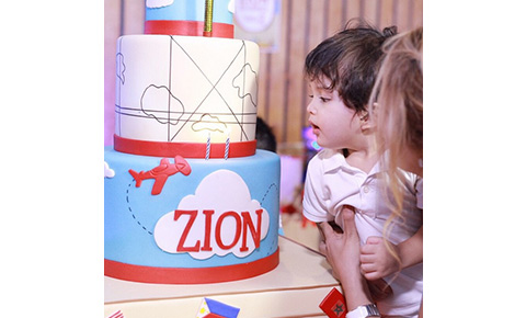 Zion cake blowing